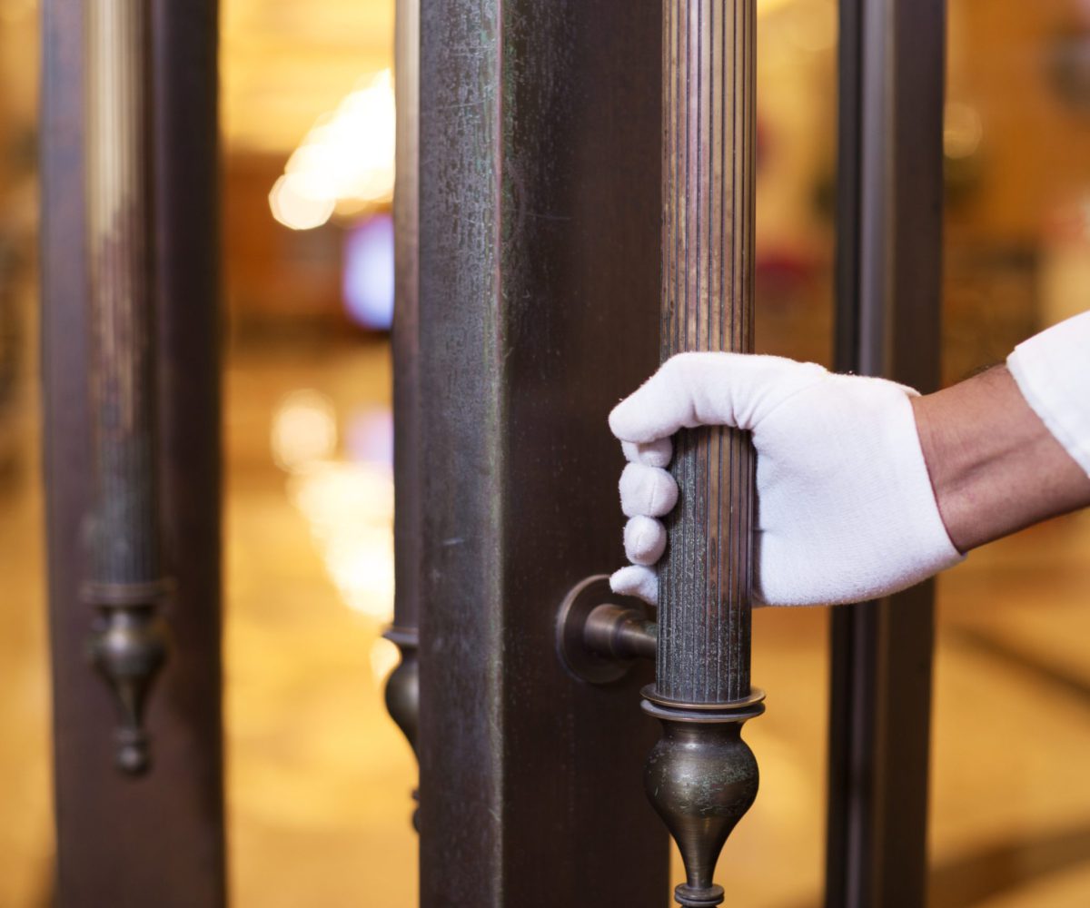 Young,Indian,Porter,Service,In,Luxury,Hotel,Lobby